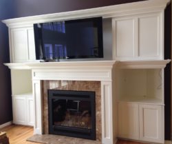 custom fireplace surround and entertainment center